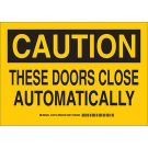 CAUTION These Doors Close Automatically Sign - Self-sticking Polyester - Black on Yellow - 7 x 10