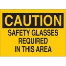 CAUTION Safety Glasses Required In This Area Sign - Self-sticking Polyester 10 x 14 - Black on Yellow